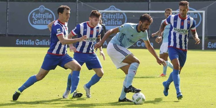El Celta B mira hacia arriba y el Coruxo cae con polémica en El Toralín